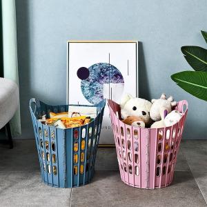 Multifunctional folding laundry basket for bathroom and toilet, wall-mountable and portable.