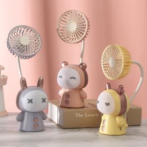 USB mini handheld fan, cartoon portable rechargeable desktop small folding electric gift mini night light fan.