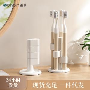 Rotating toothbrush holder, bathroom vanity countertop